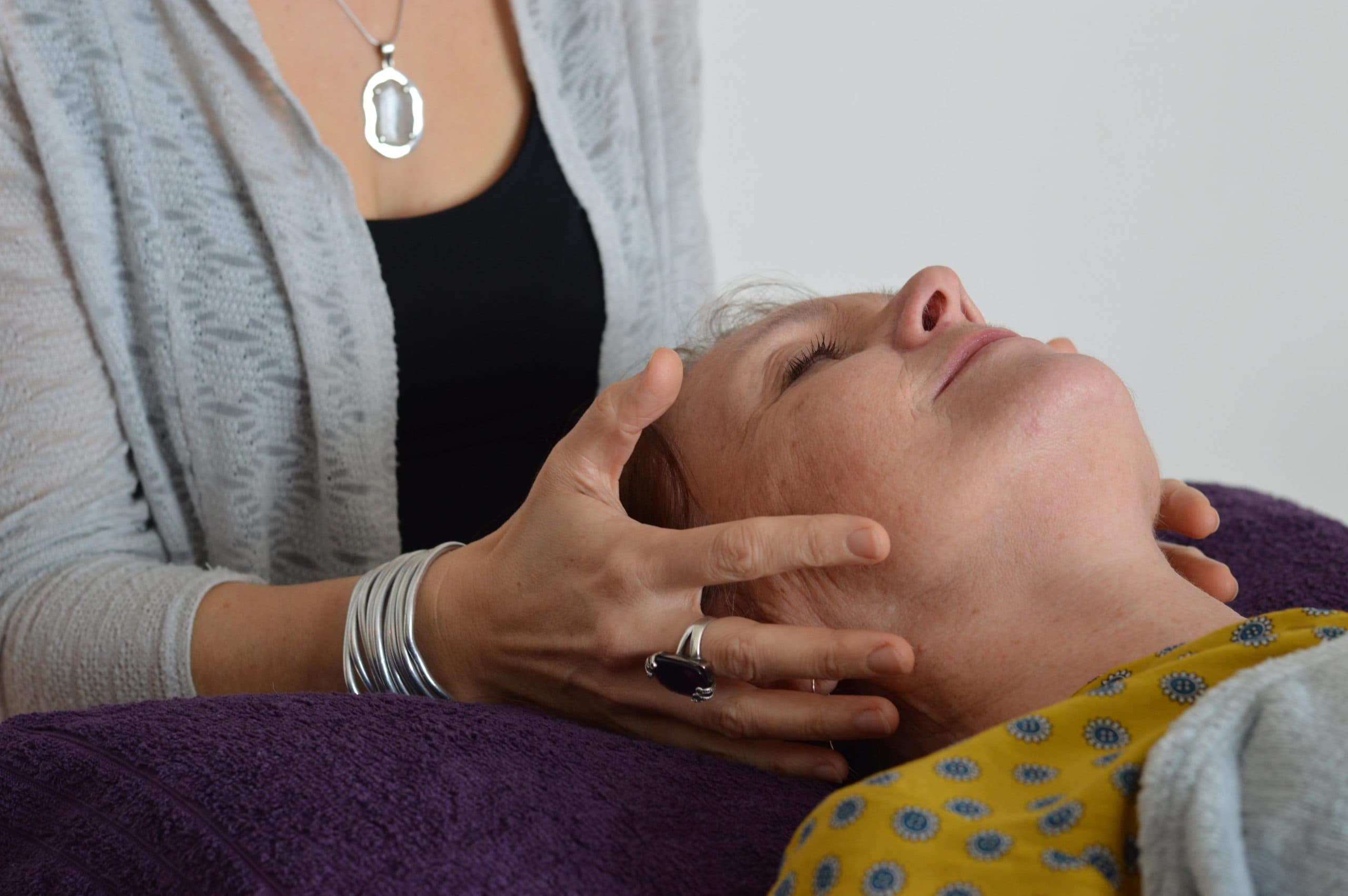 Detzi giving a gentle Reiki treatment